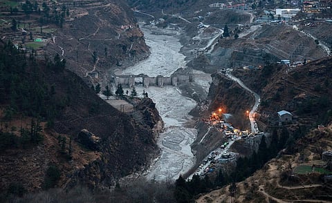 A glacier broke off in Joshimath in Uttarakhand's Chamoli district causing a massive flood in the Dhauli Ganga river, endangering the lives of people living along its banks. (Photo | Shekhar Yadav, EP