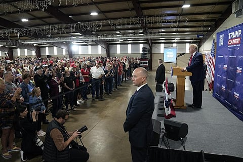 FILE - Former President Donald Trump, right, speaks during a commit to caucus rally, Wednesday, Sept. 20, 2023, in Maquoketa, Iowa. (Photo | AP)