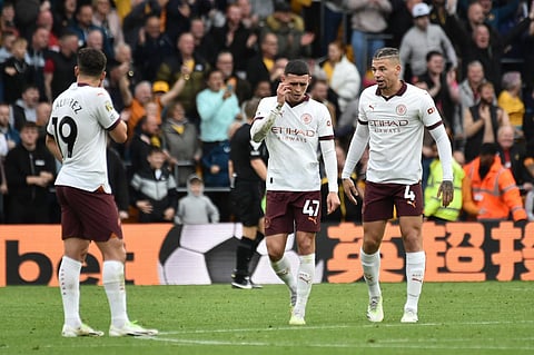 Manchester City's Kalvin Phillips, Phil Foden, and Manchester City's Julian Alvarez. (Photo | AP)