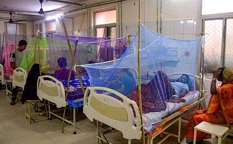 Patients undergo treatment at a dengue ward of a hospital, in Varanasi, on Sept. 30, 2023. (PTI)