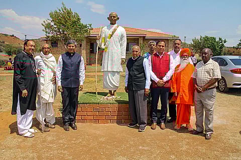 High Commissioner of India to South Africa Prabhat Kumar with the life-size statue of Mahatma Gandhi in continuation with Gandhi Jayanti celebrations at the Tolstoy Farm, in South Africa.