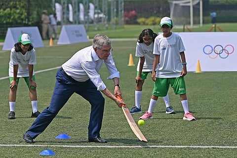 Caption and Image Credits: Thomas Bach at a football academy in Navi Mumbai on Monday | AFP