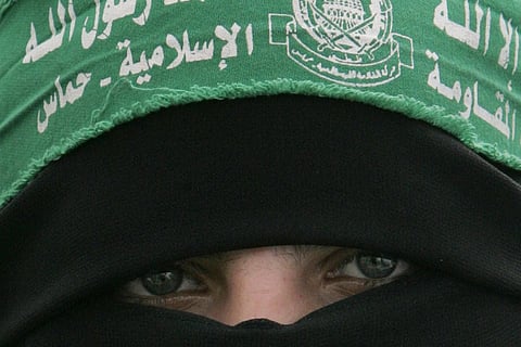FILE - A Palestinian Hamas supporter attends a protest against Israel's attacks on the Gaza Strip, in Gaza City, Monday, March 3, 2008. (Photo | AP)