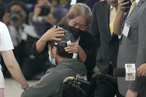 A relative hugs a Thai overseas worker evacuated from Israel on his arrival at Suvarnabhumi International Airport in Samut Prakarn Province, Thailand, Thursday, Oct 12, 2023. (Photo | AP)