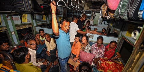 Passengers inside a special train arranged from the Raghunathpur railway station a day after multiple coaches of the Delhi-Kamakhya North East Express derailed, in Buxar district (Photo | PTI)