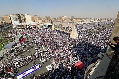 Protesters take part in an anti-Israeli demonstration at Tahrir Square in Baghdad on October 13, 2023, amid the ongoing battles between Israel and Palestinian Islamist group Hamas. (Photo | AFP)