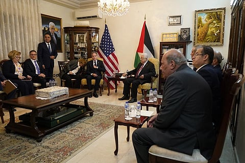 Palestinian President Mahmoud Abbas (R)and US Secretary of State Antony Blinken sit for their meeting in Amman, Jordan, Friday, Oct. 13, 2023. (Photo | AP)