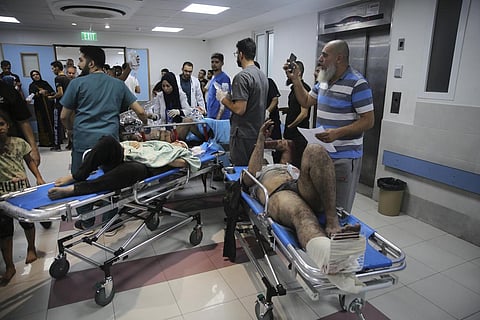 Palestinians wounded in Israeli strikes are brought to Shifa Hospital in Gaza City on Wednesday, Oct. 11, 2023. (Photo | AP)
