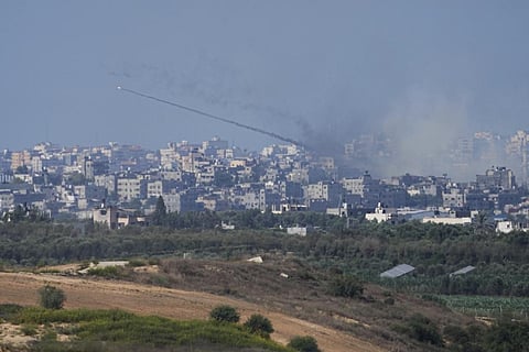 Rockets are fired toward Israel from the Gaza Strip, as seen from southern Israel, Sunday, Oct. 15, 2023. (Photo | AP)