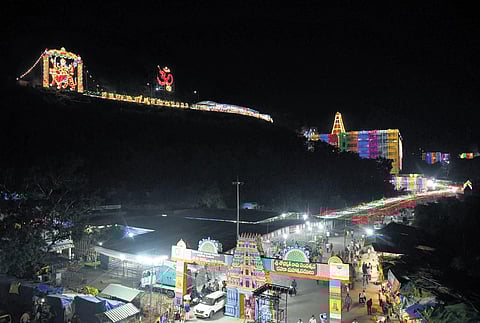 Kanaka Durga temple illuminated as part of Dussehra arrangements ahead of the festivities atop Indrakeladri Hill in Vijayawada on Saturday | Prasant Madugula