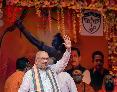 Union Home Minister Amit Shah in Kolkata during the inauguration of a Durga Puja pandal designed on the theme of the Ram Mandir in Ayodhya (Photo | PTI)