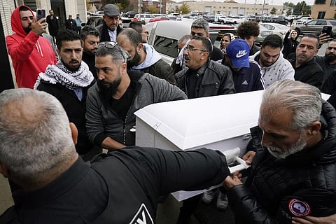 Family members of Wadea Al Fayoume bring his casket into Mosque Foundation in Bridgeview, Illinois, Monday, Oct. 16, 2023. (Photo | AP)