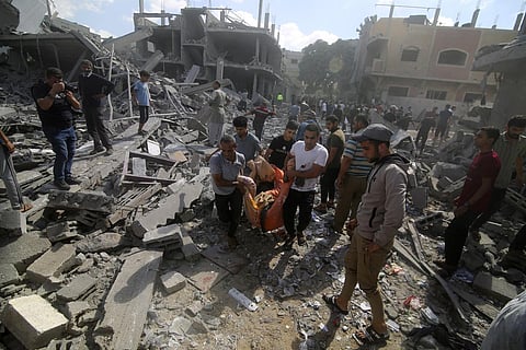 Palestinians evacuate wounded in Israeli bombardment of Rafah, southern Gaza Strip, Tuesday, Oct. 17, 2023. (Photo | AP)