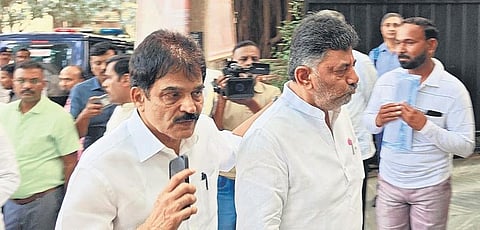 AICC General Secretary KC Venugopal and DCM DK Shivakumar arrive at AICC President Mallikarjun Kharge’s residence in Bengaluru on Monday | Express