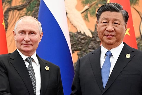 Chinese President Xi Jinping, right, and Russian President Vladimir Putin at the BRI forum. (Photo | AP)