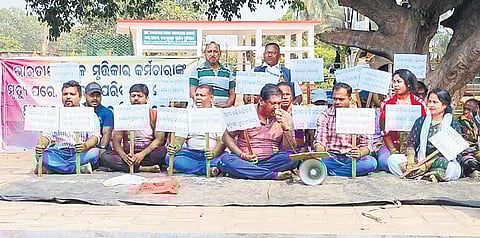 Family members of deceased IREL workers staging dharna on Tuesday I EXPRESS