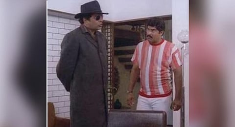 Johny with Captain Raju in the film Nadodikkattu