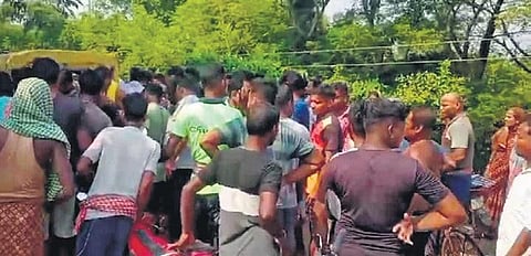 Villagers gather near the banks of Devi river after the mishap on Tuesday | Express