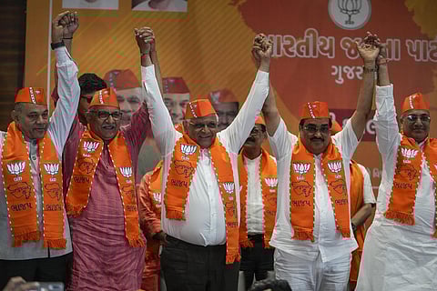 Gujarat Chief Minister Bhupendra Patel, third left, and Bharatiya Janata Party (BJP) state President C R Patil, second right, along with other leaders. (File Photo)