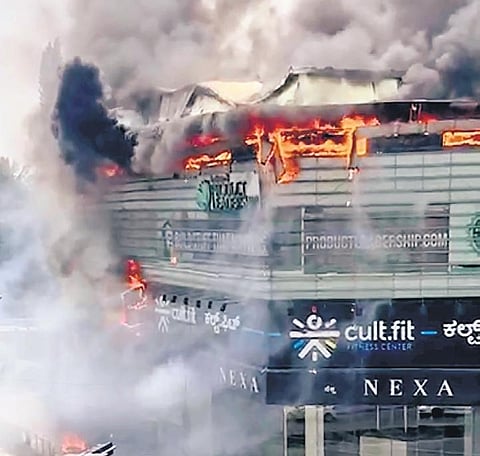 An inferno rages at Mudpipe Cafe in Koramangala, Bengaluru, on Wednesday. (Photo | Express)