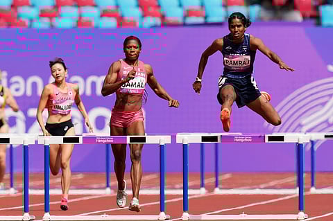 India's Vithya Ramraj during the women's 400-meter hurdles heat at the 19th Asian Games in Hangzhou, China on Monday, October 2, 2023. (Photo | PTI)