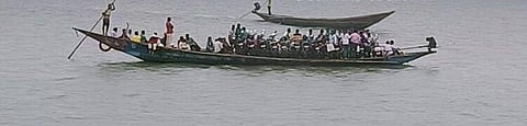 Passengers being rescued from one boat to another. (Photo | Express)