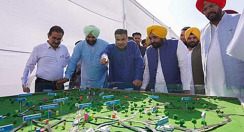 Union Minister Nitin Gadkari with Punjab CM Bhagwant Mann and others during his visit for the inspection of Delhi-Amritsar-Katra Greenfield Expressway and Amritsar Bypass, in Amritsar, Oct. 19, 2023.