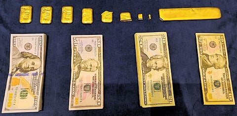 The seized smuggled gold and foreign currency notes I Express