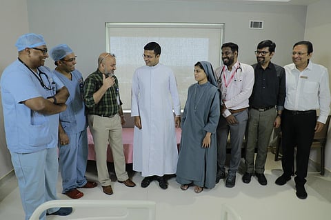 Fr Ebi Porathur with Sr Bini Maria and medical team