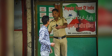 Representational Image: A security person keeps vigil outside the Popular Front of India (PFI) party office in Navi Mumbai, Thursday, Sept. 22, 2022. (Photo | PTI)