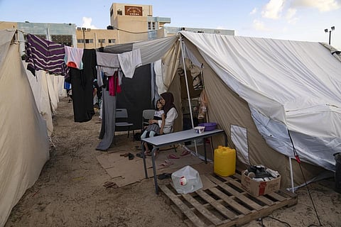 Palestinians displaced by the Israeli bombardment of the Gaza Strip in the UNDP-provided tent camp in Khan Younis on Thursday, Oct 19, 2023. (Photo | AP)