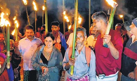 Local residents protesting the task force’s action against encroachments on government land in Chinnakkanal village on Thursday night | Express