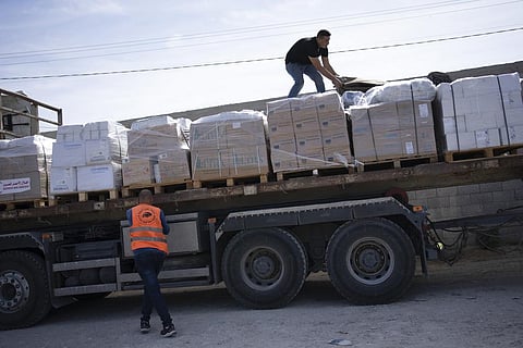 Trucks with humanitarian aid for the 'Gaza Strip enter from Egypt in Rafah on Saturday, Oct. 21, 2023. (Photo | AP)