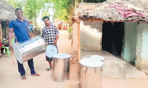 Members of a band party at a village in Kendrapara | Express