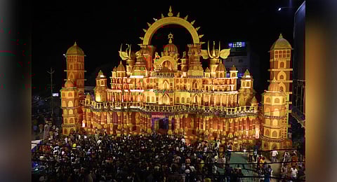 People celebrating satami Puja at Bomikhal Durga Puja pandal in Bhubaneswar on Sunday (Photo | Shamim Qureshy)