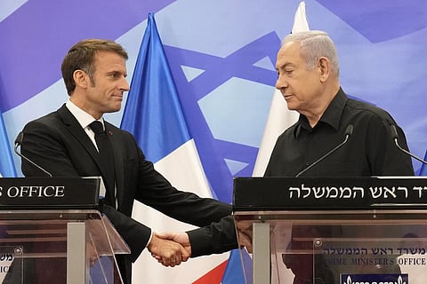 French President Emmanuel Macron with Israeli Prime Minister Benjamin Netanyahu. (Photo | AP)