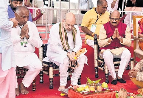 Amit Shah performing a ceremony in Kalol, Gujarat | express