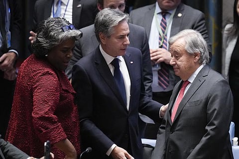 US Secretary of State Antony Blinken, center, and US Ambassador to the United Nations Linda Thomas-Greenfield, left, talk with UN Secretary-General Antonio Guterres (AP)