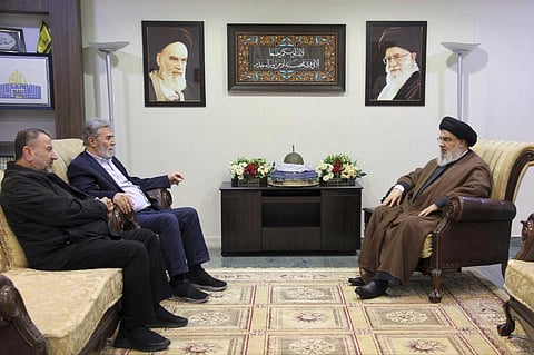 Hezbollah leader Sayyed Hassan Nasrallah, right, meets with Ziad al-Nakhleh, the head of Palestinian Islamic Jihad, centre, and Hamas deputy chief, Saleh al-Arouri, in Beirut, Lebanon (Photo | AP)