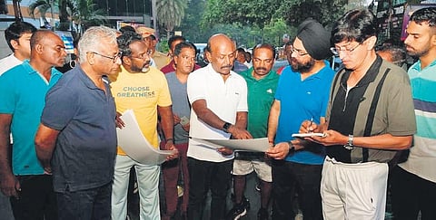 Health Minister Ma Subramanian along with other officials inspect the Health Walk Track on Wednesday. (Photo | Express)