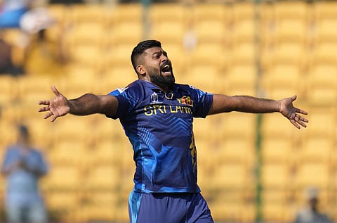 Lahiru Kumara celebrates the wicket of England's Liam Livingstone during the World Cup match in Bengaluru (Photo | AP)
