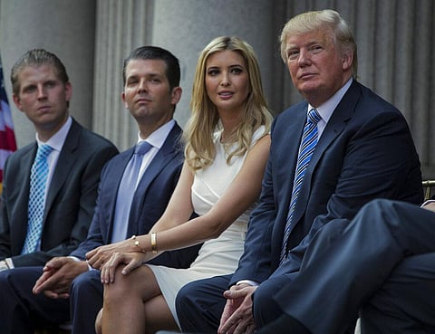 Donald Trump (right) sits with his children (from left) Eric Trump, Donald Trump Jr., and Ivanka Trump. (File Photo | AP)