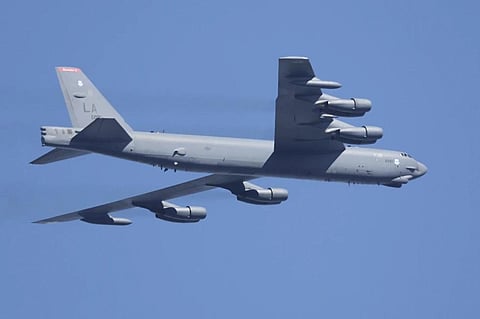 A US Air Force B-52 bomber flies during the Seoul International Aerospace and Defense Exhibition 2023. (Photo | AP)