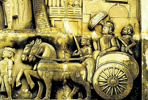 A wall mural featuring King Ashoka along with his troops at the Dhauli hills in Odisha