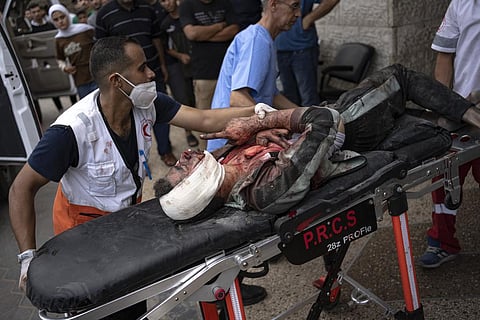 Palestinian wounded in Israeli bombardment is brought to a hospital in Deir al Balah, south of the Gaza Strip, Sunday, Oct. 29, 2023. (Photo | AP)