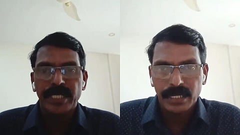 Dominic Martin speaking on video.