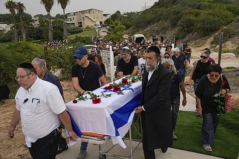 Friends and relatives of Yonat Or carry her coffin during her funeral at Kibbutz Palmachim, Israel, Sunday, Oct. 29, 2023. (Photo | AP)