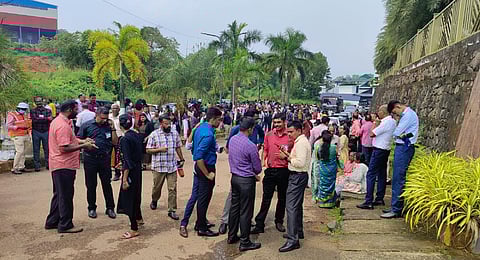People gathered at Zamara International, a convention centre, in Kalamassery, Kerala, which witnessed serial blasts, on Sunday morning. (Photo |A Sanesh, EPS)