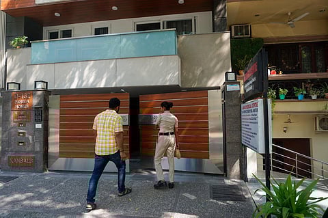 A police personnel arrives at the office of NewsClick at Saket during raids by Delhi Police's Special Cell on its premises, in New Delhi, on Oct. 3, 2023. (PTI)