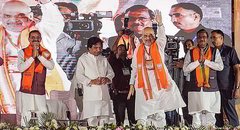 Union Home Minister Amit Shah accompanied by Madhya Pradesh BJP president VD Sharma during a public meeting ahead of the assembly elections, in Ujjain, Sunday, Oct. 29, 2023. (PTI)